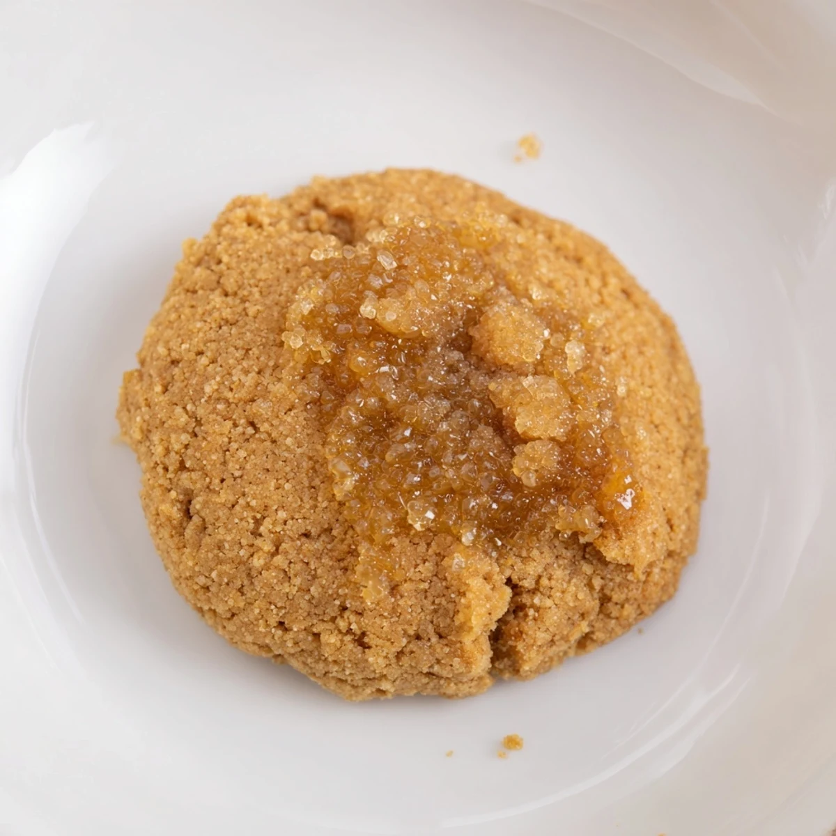 Chewy Soft-Baked Ginger and Molasses Cookies, spiced and sugary, cooling on a rack after baking.