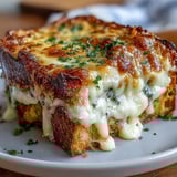 Slices of savory ham and buttery bread in a comforting Croque Monsieur Casserole, perfect for an easy French-inspired brunch or dinner.