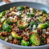 Garlic, paprika, and a sprinkle of Parmesan flavor this easy one-pan dinner.